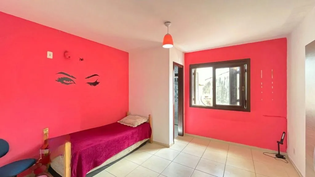Imagem Casa de 2 dormitórios à venda Rua Heitor Kramer, Guarujá - Porto Alegre