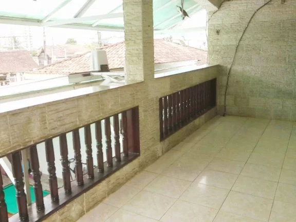 Imagem Sobrado com 4 dormitórios à venda, 216 m² por R$ 750.000,00 - Caiçara - Praia Grande/SP