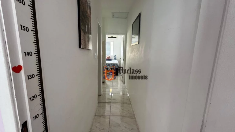 Imagem Sobrado com 2 dormitórios à venda, 62 m² por R$ 430.000,00 - Vila Guilhermina - Praia Grande/SP