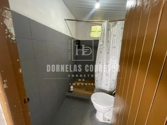 Imagem Oportunidade! Terreno + 3 Casas Prontas para Morar ou Alugar