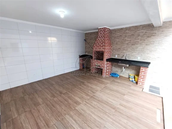 Imagem Espaçosa Casa Térrea à Venda no Ocian, Praia Grande - 3 Quartos e Churrasqueira