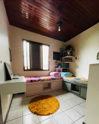 Imagem Casa com piscina no centro de Guaratuba para venda, amplo terreno!