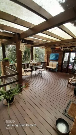 Imagem Casa Rústica em Garopaba-SC: 3 Suítes, Vista Panorâmica, Jacuzzi e 3000m² de Terreno