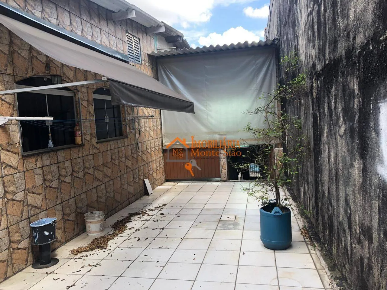 Imagem Casa com 3 dormitórios à venda, 377 m² por R$ 693.000,00 - Taboão - Guarulhos/SP