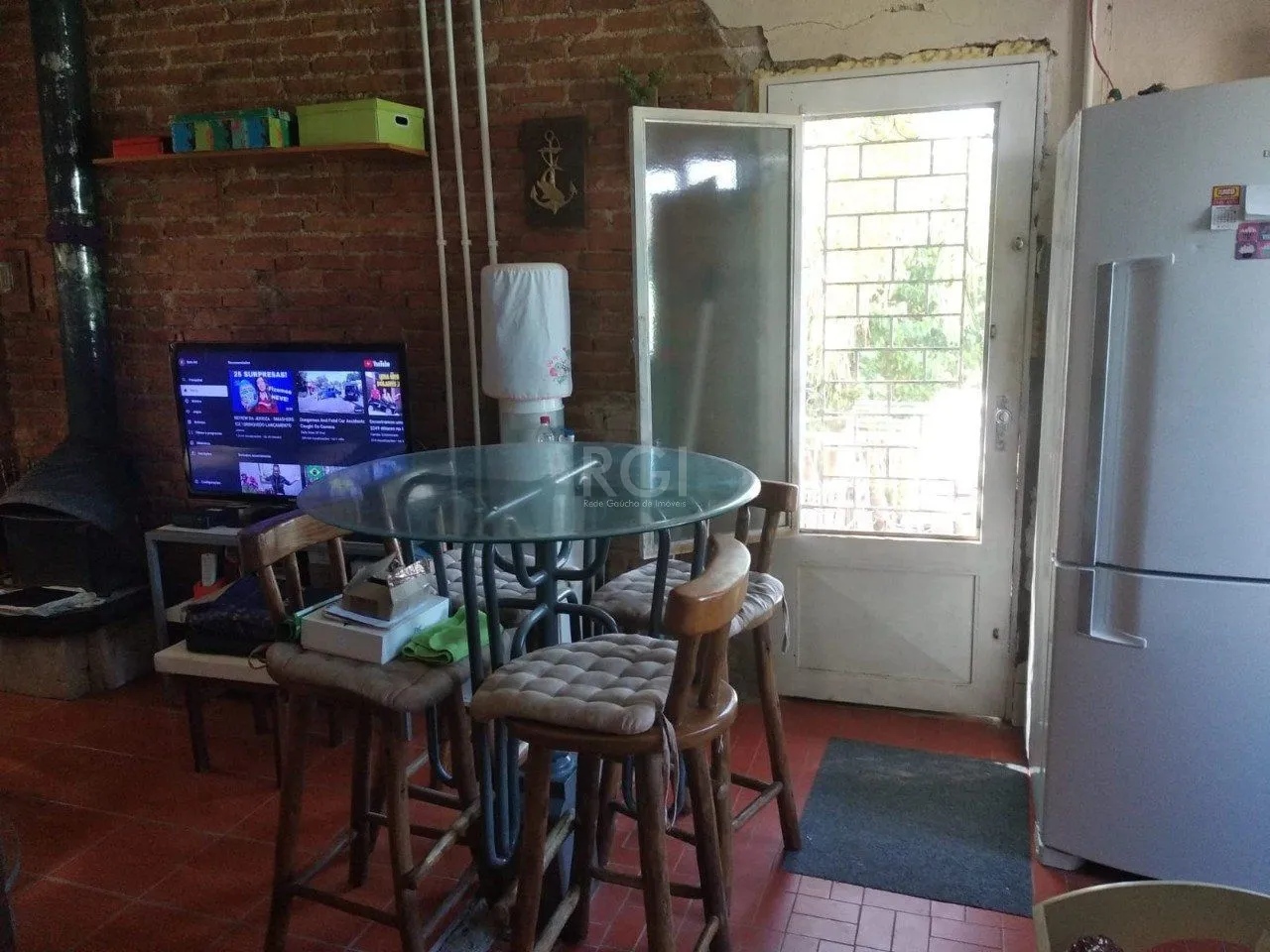Imagem Casa 2 dormitórios, sala, banheiro garagem coberta, terreno 694m² bairro Camaquã, Porto Alegre/RS