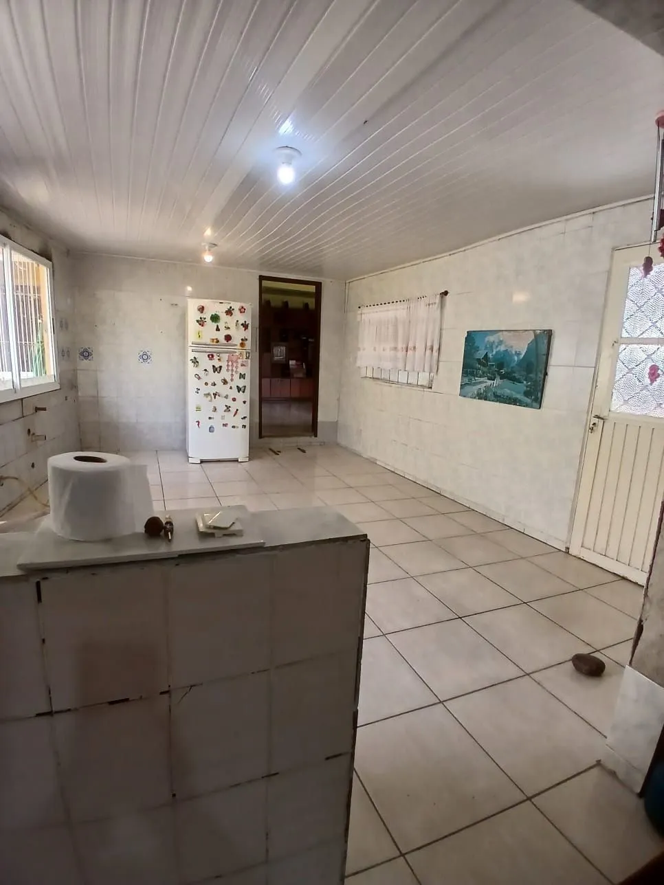 Imagem Ampla casa com patio no bairro Rubem Berta .
