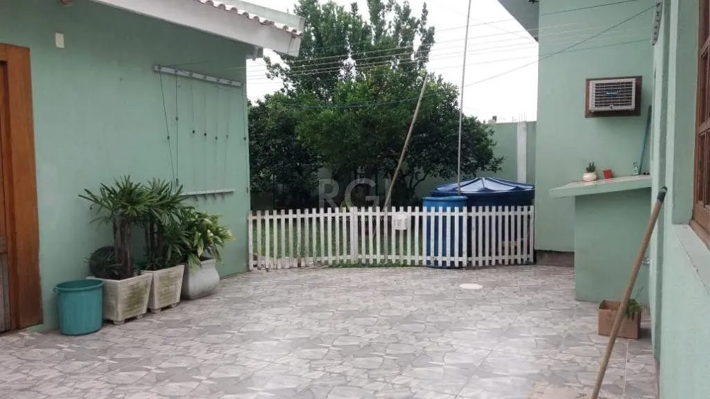 Imagem Casa com 3 dormitórios à venda, 230,11 m² por R$ 900.000,00 - Igara III - Canoas/RS