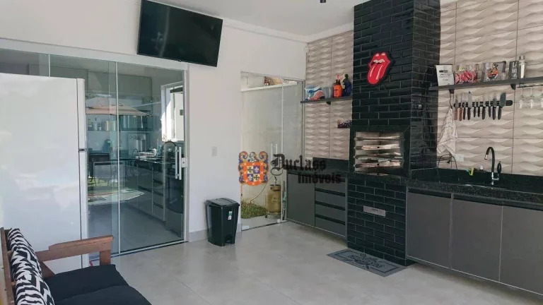 Imagem Casa com 3 dormitórios à venda, 107 m² por R$ 890.000,00 - Massaguaçu - Caraguatatuba/SP