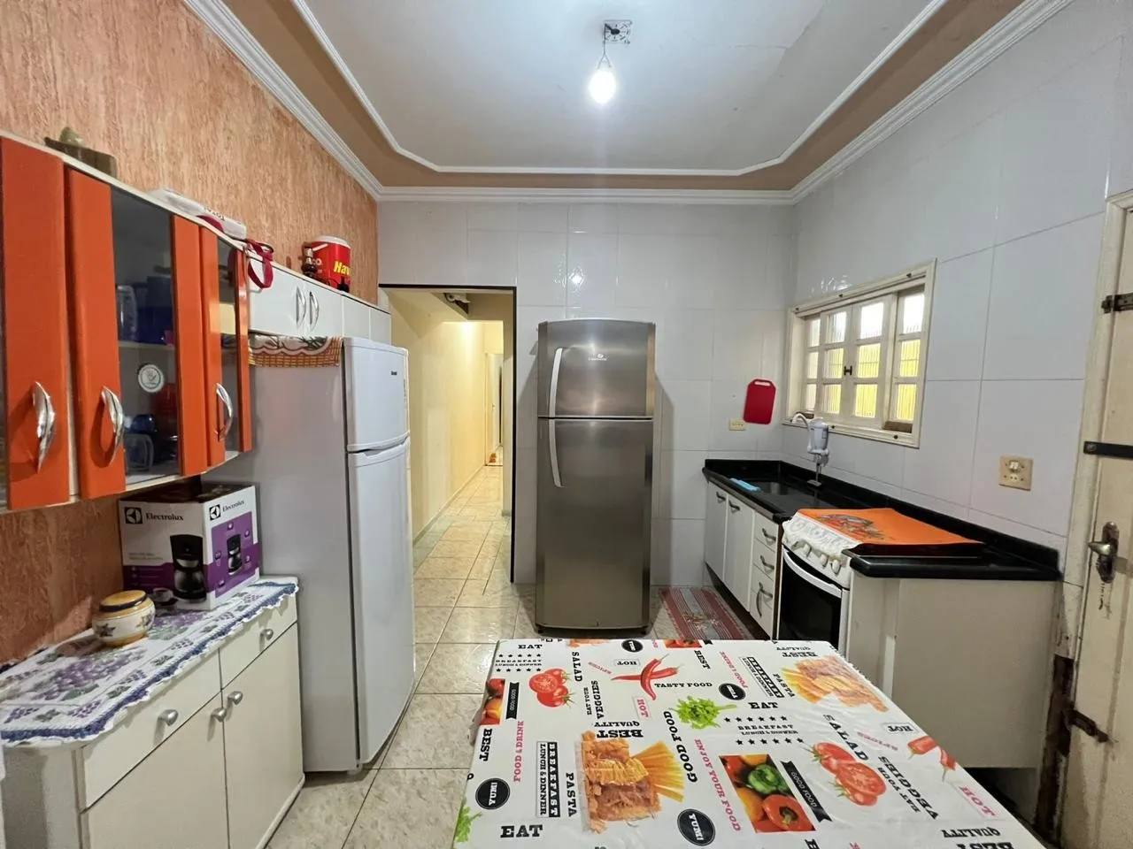 Imagem Casa para Venda em Praia Grande, Caiçara, 2 dormitórios, 1 suíte, 1 banheiro, 2 vagas