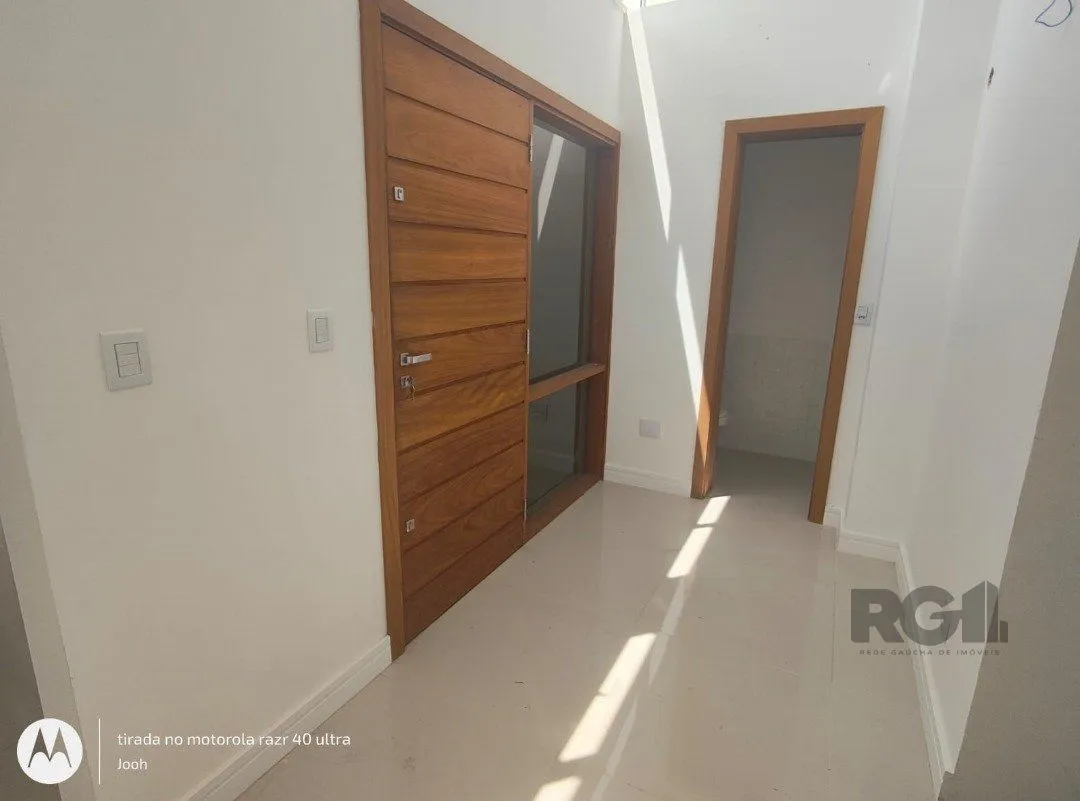 Imagem Casa em Condomínio fechado com 3 dormitórios no bairro Vila Nova em Porto Alegre, RS
