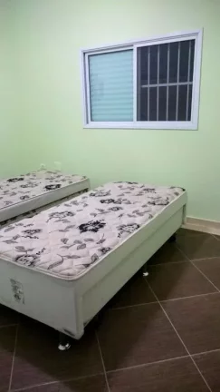 Imagem Sobrado à venda, 320 m² por R$ 1.200.000,00 - Maracanã - Praia Grande/SP