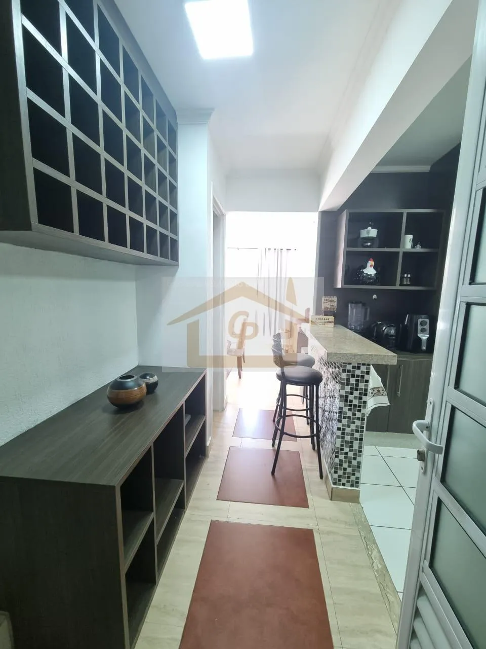 Imagem Bela área Gourmet 3 quartos sendo um suíte, forno de pizza, fogão e churrasqueira, 2 vagas