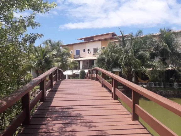 Imagem Village 3 Quartos Nascente com Vista Verde à Beira do Rio Joanes - Lazer Completo!"
