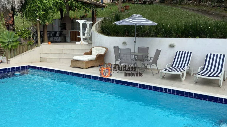 Imagem Casa com 3 dormitórios à venda, 290 m² por R$ 1.600.000 - Prainha - Caraguatatuba/SP