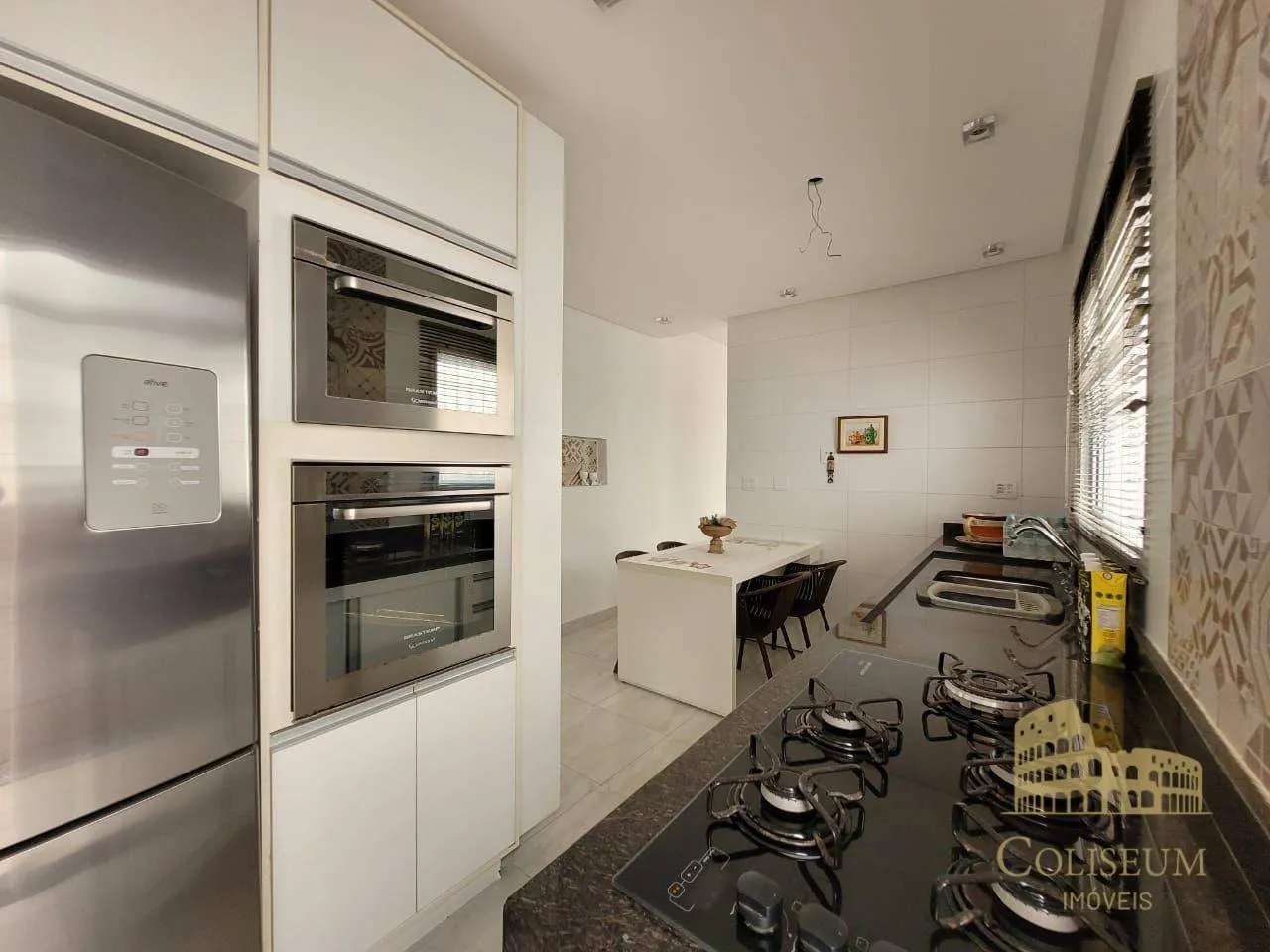 Imagem Casa com 3 dormitórios à venda, 113 m² por R$ 780.000,00 - Aviação - Praia Grande/SP
