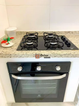Imagem Apartamento com 2 dormitórios à venda, 72 m² por R$ 660.000,00 - Loteamento João Batista Julião - Guarujá/SP