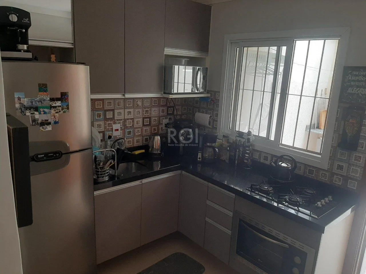 Imagem Casa com 2 quartos, 2 suítes, varanda, vaga, no bairro Aberta dos Morros, Poa/RS