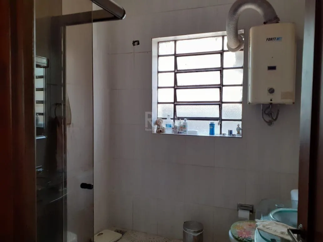 Imagem Casa para Venda - 120m², 3 dormitórios, 1 vaga - Santa Tereza