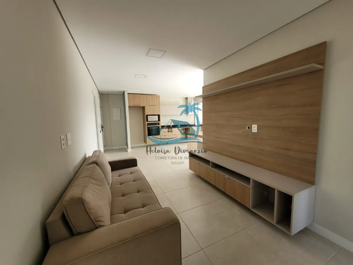 Imagem Excelente Apartamento com 3 dormitórios semi mobiliado e vista para o mar, a venda a 250 metros da orla de Itagua em Ubatuba.