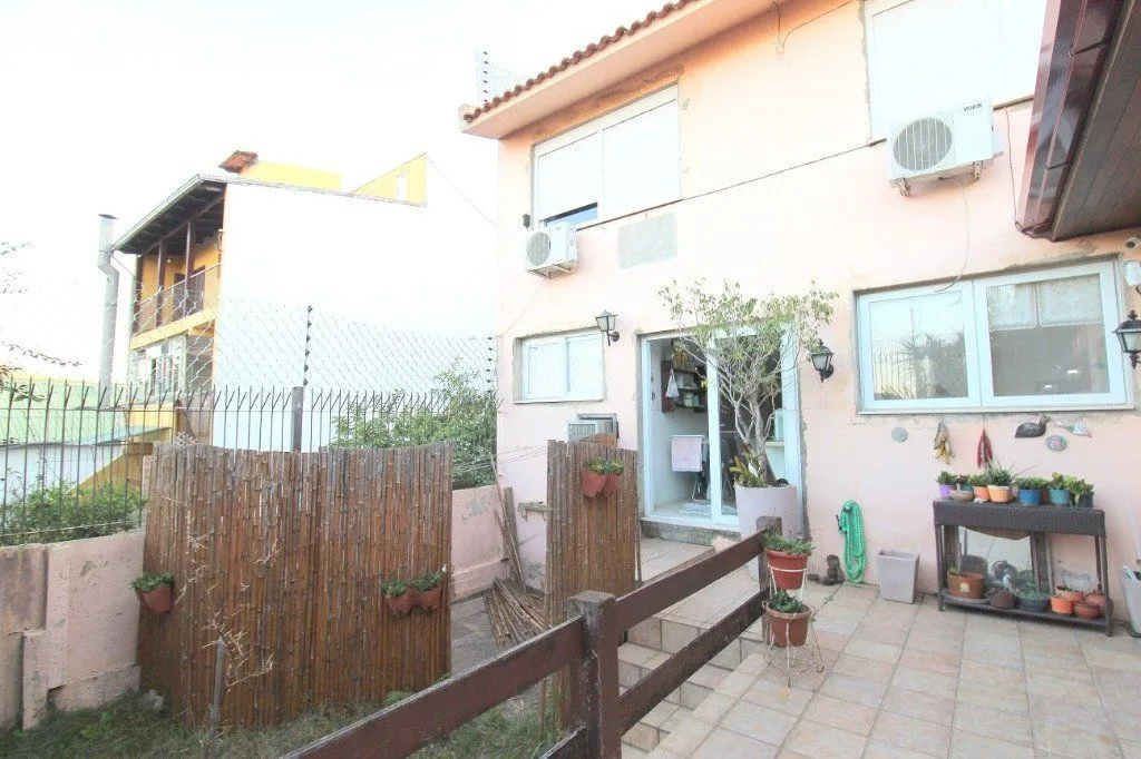 Imagem Casa para Venda - 100m², 3 dormitórios, 3 vagas - Nonoai