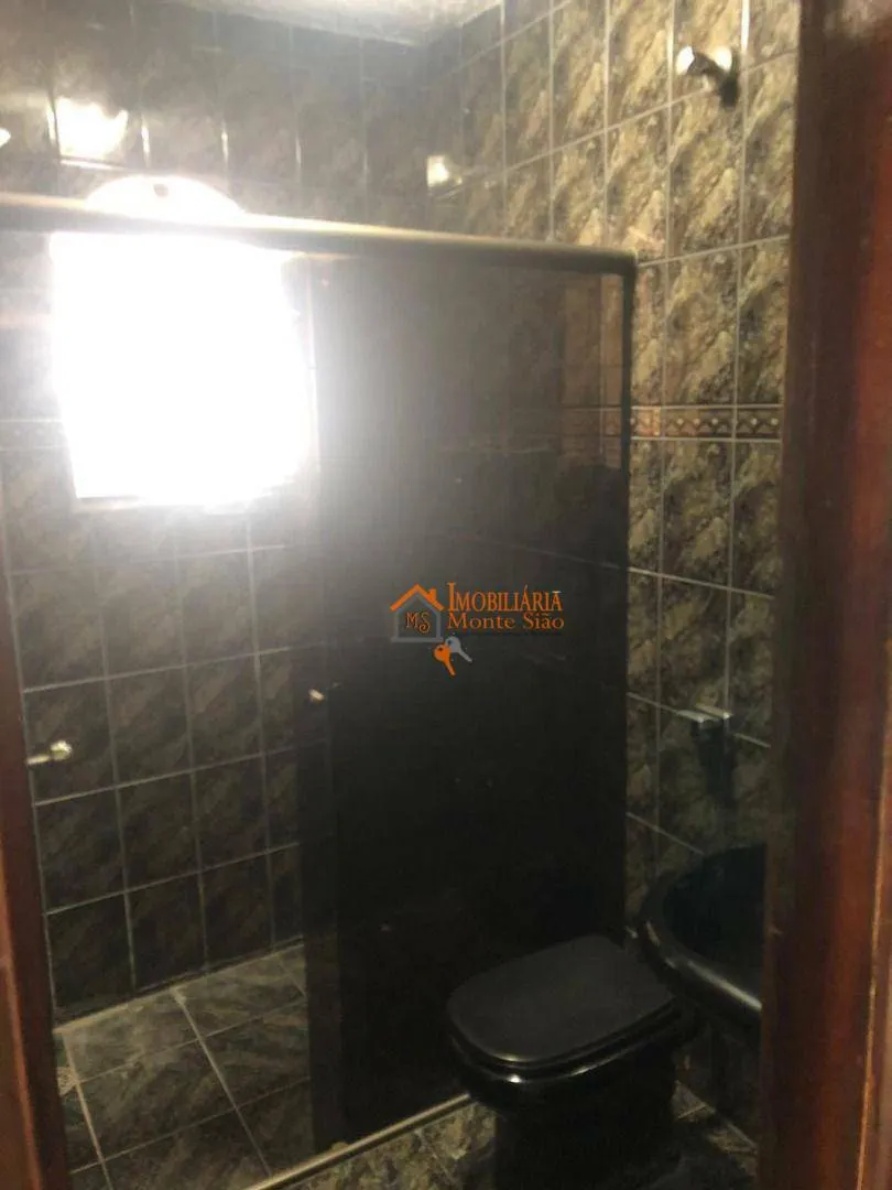 Imagem Casa com 3 dormitórios à venda, 377 m² por R$ 693.000,00 - Taboão - Guarulhos/SP