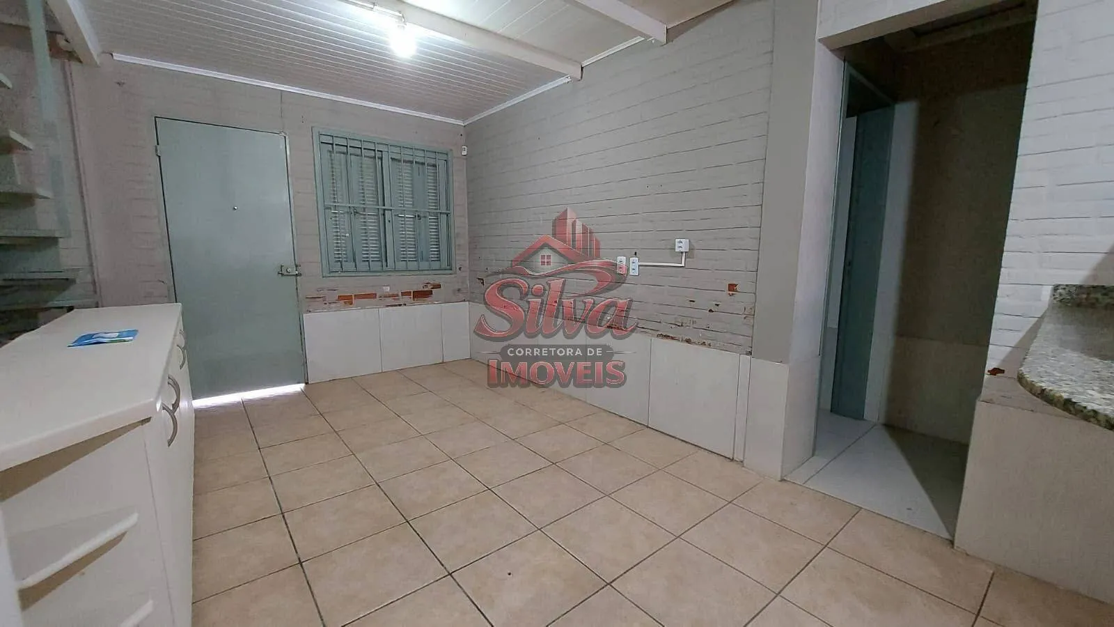 Imagem Casa com suíte à venda em Imbé com lareira e 103m²