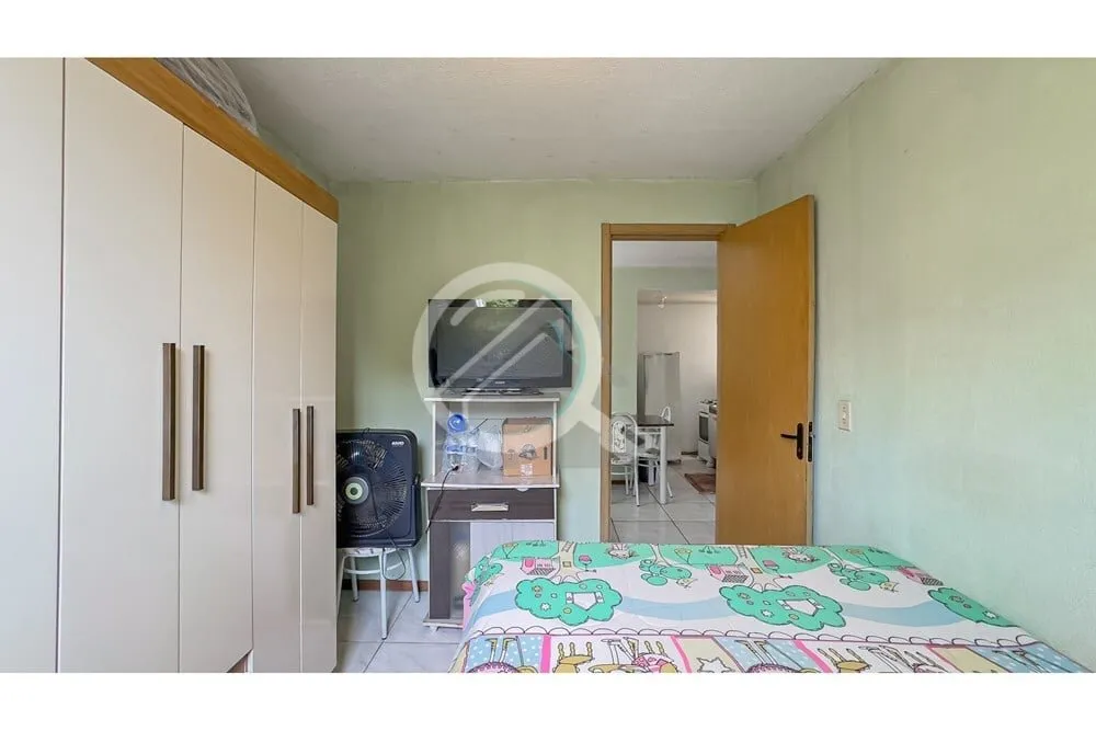 Imagem Descubra o seu novo lar no bairro Partenon. Este apartamento residencial à venda apresenta uma opor...