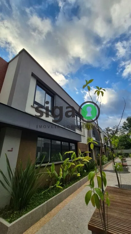 Imagem CASA EM CONDOMINIO COM 4 QUARTOS SENDO SUITES
