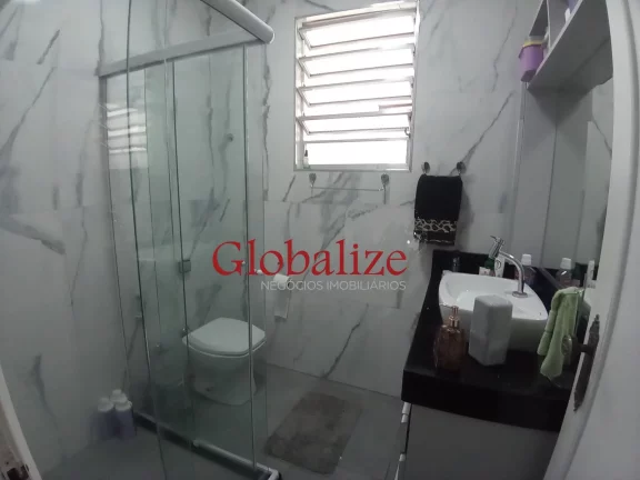 Imagem Casa em Vila à venda com 2 quartos, 2 banheiros, churrasqueira na Vila Mathias em Santos por R$426.000,00