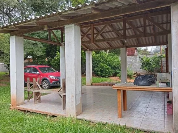 Imagem Sítio com Casa em condomínio Fechado, Próximo da portaria, junto a RS040