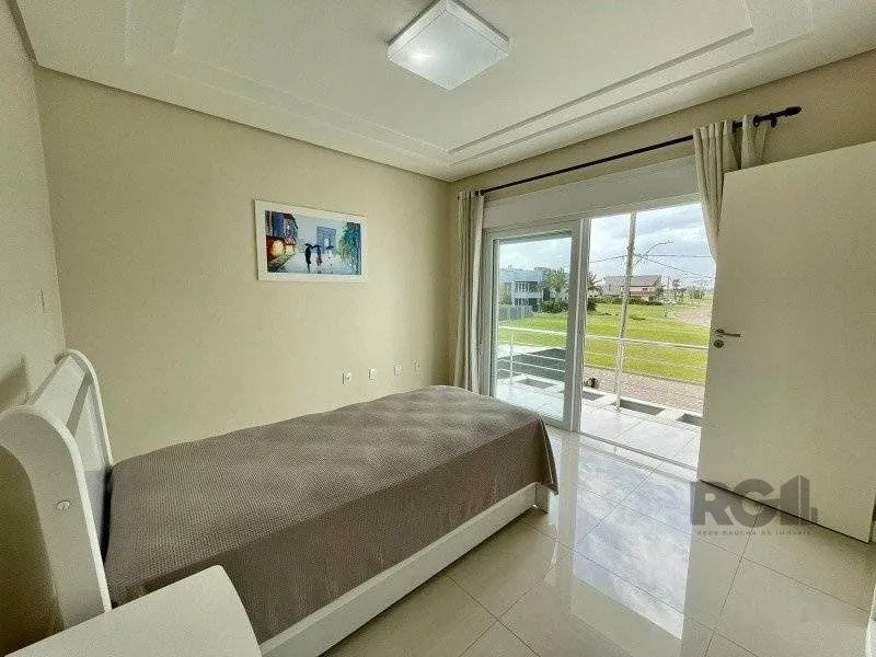 Imagem Casa de Condomínio em Atlântida Sul