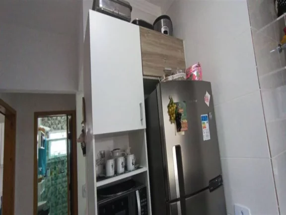 Imagem Casa com 2 dormitórios à venda, 63 m² por R$ 410.000,00 - Mirim - Praia Grande/SP