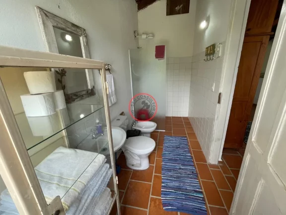 Imagem CASA Locação 3 QUARTOS SENDO 1 SUITE 2 SALA AMPLA,3 BANHEIROS.LAVANDERIA,3 VAGAS. CHURRASQUEIRA, DESPENSA E LAVANDERIA MOBILIADA