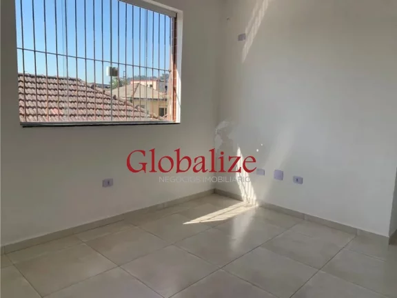 Imagem Casa sobreposta alta à venda com 72m², 2 quartos, 1 suíte, churrasqueira por R$315.000,00 em Santos