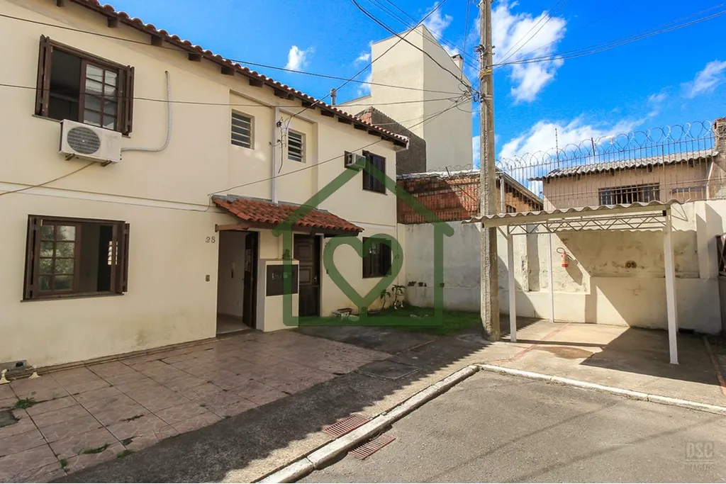Imagem Casa em condomínio localizado próximo ao Hospital Vila Nova. Com 3 dormitórios, sendo 1 suíte, 8...