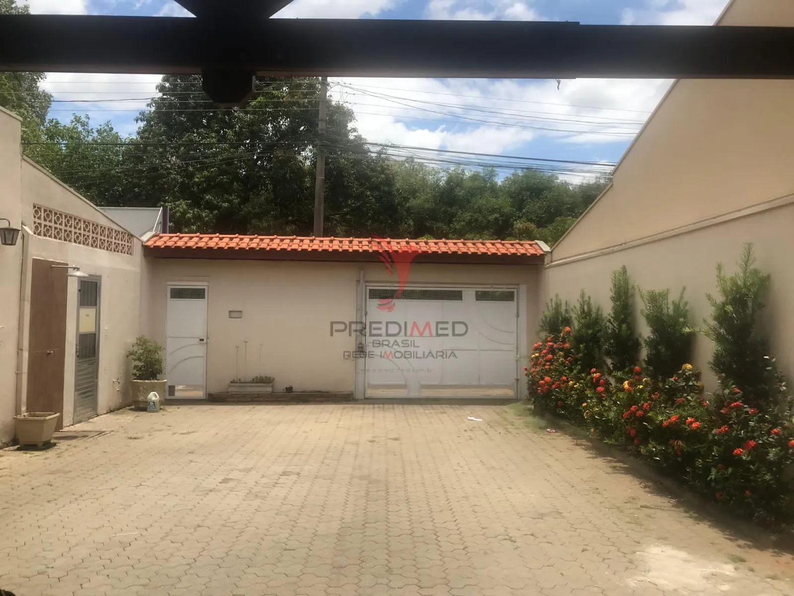 Imagem Imóvel em Americana, com casa e salão comercial