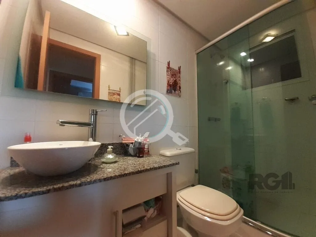 Imagem Apartamento de dois dormitórios sendo um suíte, living dois ambientes com churrasqueira, cozinha e...