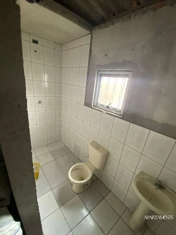Imagem Terreno com 3 Casas com 3 vagas de carro e moto.