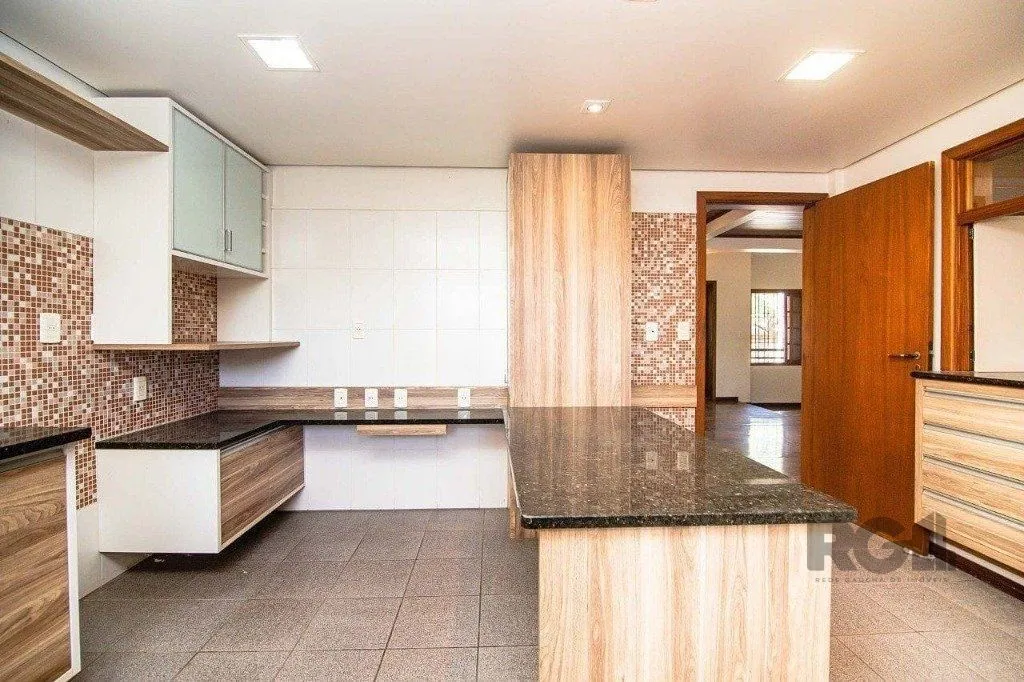 Imagem Casa para Venda - 443m², 3 dormitórios, 4 vagas - Alto Petrópolis