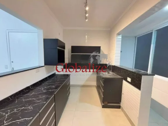 Imagem Apartamento à venda com 70m², 2 quartos, cozinha americana, 1 vaga por R$430.000 no Gonzaga em Santos