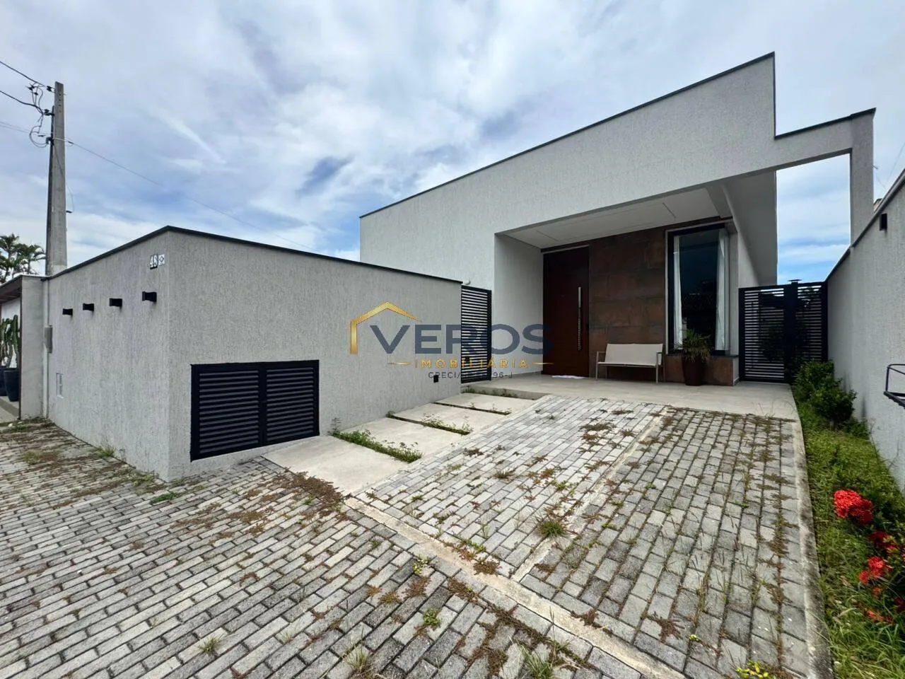 Foto do imóvel Casa á venda no Portal Patrimonium Massaguaçu com piscina Caraguatatuba