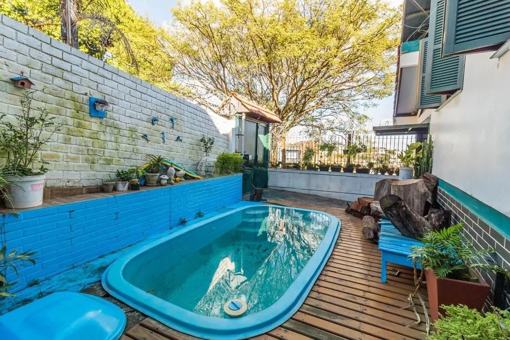 Imagem CASA 03 dormitórios, 2 suítes, 216m² privativos com piscina no BAIRRO MEDIANEIRA