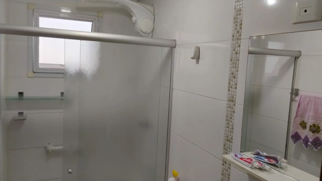 Imagem Apartamento de Luxo no Boqueirão: 2 Quartos, 2 Suítes, 1 Sala, 3 Banheiros, 2 Vagas de Garagem, 90m² de Pura Elegância em Praia Grande-SP!