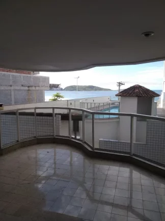 Imagem De frente para o mar da Praia do Morro 3 quartos sendo uma suíte +DCE duas vagas de garagem. Prédio com área de lazer