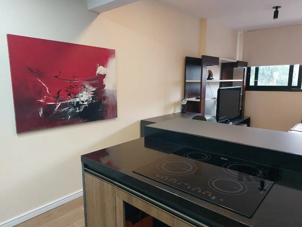 Imagem Apartamento stidio com 1 dormitório, 1 vaga de garagem no Bairro Auxiliadora.