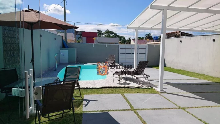 Foto do imóvel Casa com 3 dormitórios à venda, 107 m² por R$ 890.000,00 - Massaguaçu - Caraguatatuba/SP