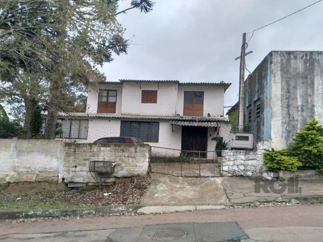 Imagem Casa 5 dormitórios, bairro Camaquã.