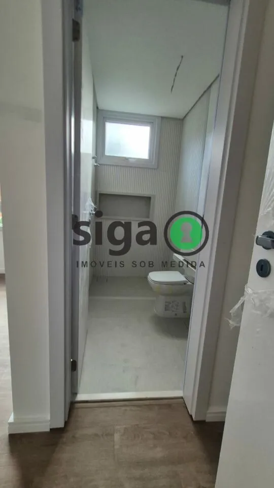 Imagem CASA EM CONDOMINIO COM 4 QUARTOS SENDO SUITES