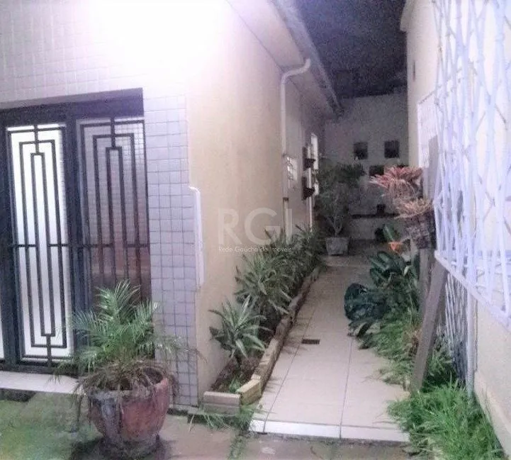 Imagem Casa para Venda - 159m², 3 dormitórios, 3 vagas - Menino Deus