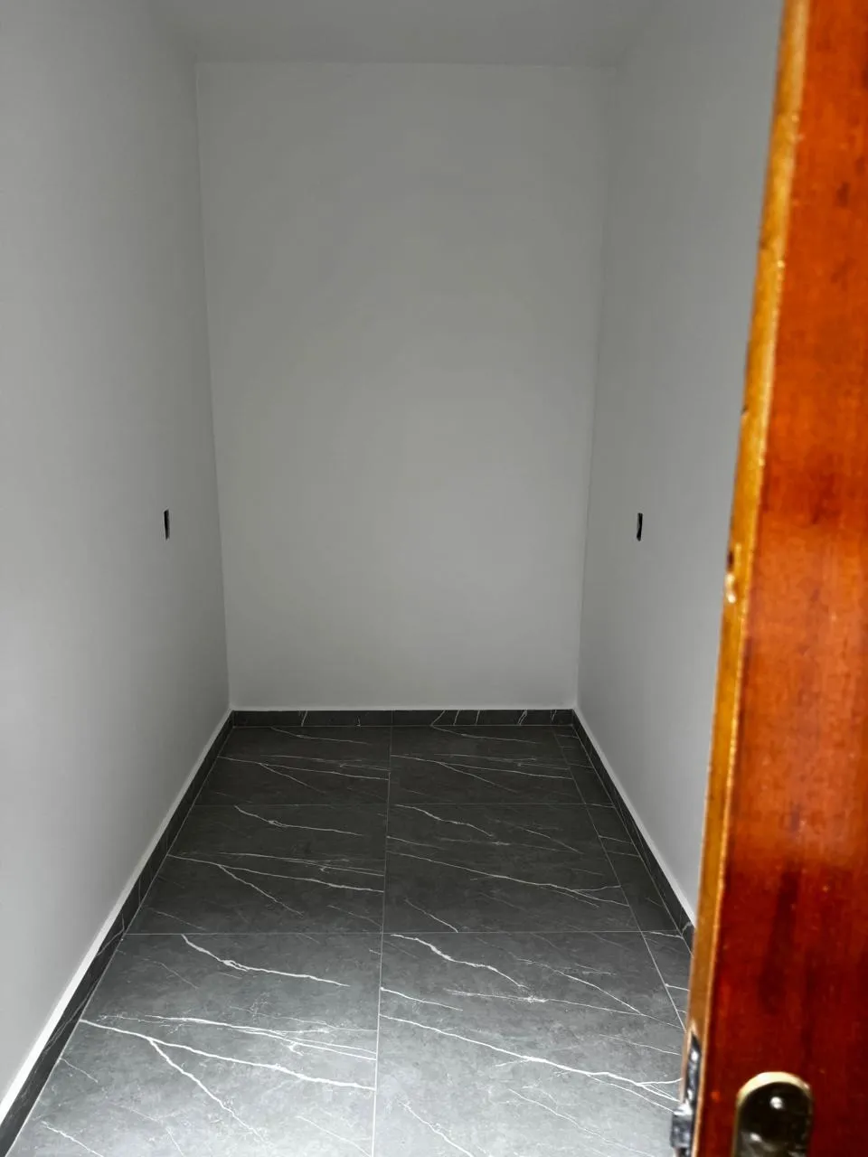 Imagem Casa nova, construída em 2025, 51,90 m² de área construída, 2 dormitórios, 1 banheiro, sala, cozinha, área de serviço e garagem para 1 carro e 1 noto.